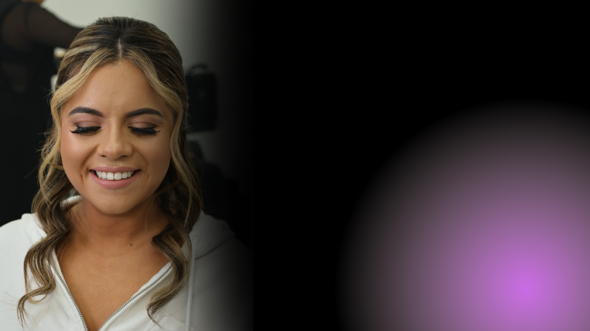 Bridal makeup look with soft waves from the salon's wedding day menu