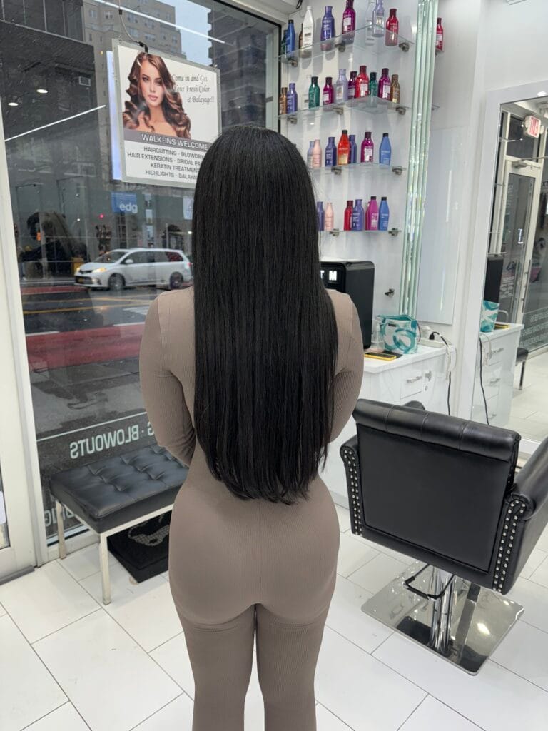 Long straight black hair, viewed from behind